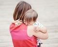 Woman mother comforting her crying little toddler boy son Royalty Free Stock Photo