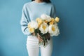 woman yellow pink bouquet romantic white floral hand flower sweater blue. Generative AI. Royalty Free Stock Photo