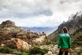 Woman on mountain admiring majestic landscape in Arizona, USA