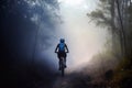 Woman Mountain Biking on a Trail in Early Morning with Mist and Backlight, Generative AI