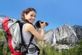 Woman mountain hiker taking pictures in Yosemite Royalty Free Stock Photo