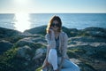 woman in the mountains near the sea and t-shirt sweater model sunset summer Royalty Free Stock Photo