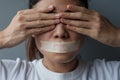 Woman with mouth sealed in adhesive tape. Free of speech, freedom of press, Human rights, Protest dictatorship, democracy, liberty