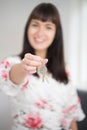 Woman Moving Into New Home Holding Bunch Of Keys