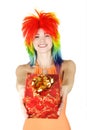 Woman in multicolored wig with gift