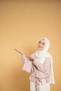 woman muslim asian woman presenting dressed in the hijab modern style Royalty Free Stock Photo