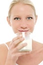 Woman with mustache dirty of milk and a glass of m