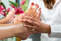 Woman in nail studio receiving pedicure Royalty Free Stock Photo