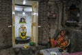 Woman in the Naroshankar Temple at the Ganga Ghat in Nashik, India