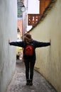 Woman on a narrow street Royalty Free Stock Photo