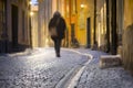 Woman in narrow street Royalty Free Stock Photo