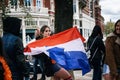 Woman with national Dutch flag