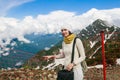 Woman near the fence on the ski slopes in summer. Ski resort Sochi Royalty Free Stock Photo