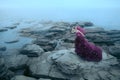 Woman near foggy sea Royalty Free Stock Photo