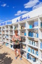 Woman near free beach library opened at the Black Sea resort