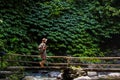 Woman near Nung Nung waterfal on Bali, Indonesia Royalty Free Stock Photo