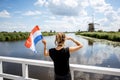 Woman near the old windmills in Netherlands