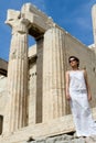 Woman near Propylaea Columns Acropolis Athens Gree Royalty Free Stock Photo