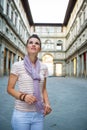 Woman near uffizi gallery in florence, italy Royalty Free Stock Photo