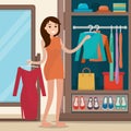 Woman near wardrobe for cloths with mirror.