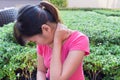 Woman neck pain in the park Royalty Free Stock Photo