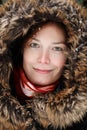 Woman in with neck piece and red scarf