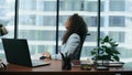 Woman nervous work failure sitting at desk closeup. Girl throwing crumpled paper Royalty Free Stock Photo