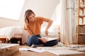 Woman In New Home Putting Together Self Assembly Furniture Royalty Free Stock Photo