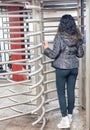 Woman in New York entering subway station gate Royalty Free Stock Photo