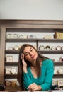 Woman next to wood table