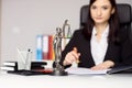 Woman notary public stamping the document.