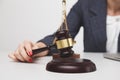 Woman notary with wooden gavel isolated,