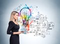 Woman with notebook near business strategy plan and lightbulb on grey wall Royalty Free Stock Photo