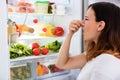 Woman Noticed Smell In Front Of Refrigerator