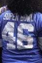 Woman with NY Giants team autographed shirt