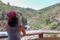 Woman observing nature around Paiva`s walkways , in Arouca