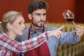 woman oenophile inspecting aged wine Royalty Free Stock Photo