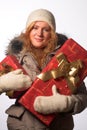 Woman offering a christmas gift Royalty Free Stock Photo