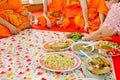 Offering foods to monks in Thai culture