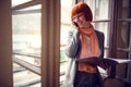 Woman in office arranging meetings in office Royalty Free Stock Photo