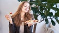 Woman in office eating salad at working place. Concept of lunch at work and eating healthy food. healthy eating concept Royalty Free Stock Photo