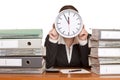 Woman in office has stress with time pressure Royalty Free Stock Photo