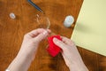 Wiping glasses on the desk in the office