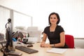 Woman office worker at desk Royalty Free Stock Photo