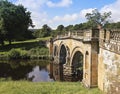 A Woman on an Old Bridge in England