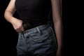 Woman one hand holding pistol gun at the black background, Young sexy girl with carrying a handgun, Pretty women stand with a guns Royalty Free Stock Photo