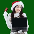 Woman online shopping to prepare xmas Royalty Free Stock Photo