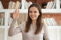 Woman online teacher making video call waving hand greeting trainee