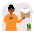 A woman with an open envelope with a letter. Empty sheet of paper for text template. Mail concept. Sending a message