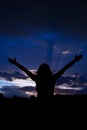 Woman with open hands to clouds sky Royalty Free Stock Photo